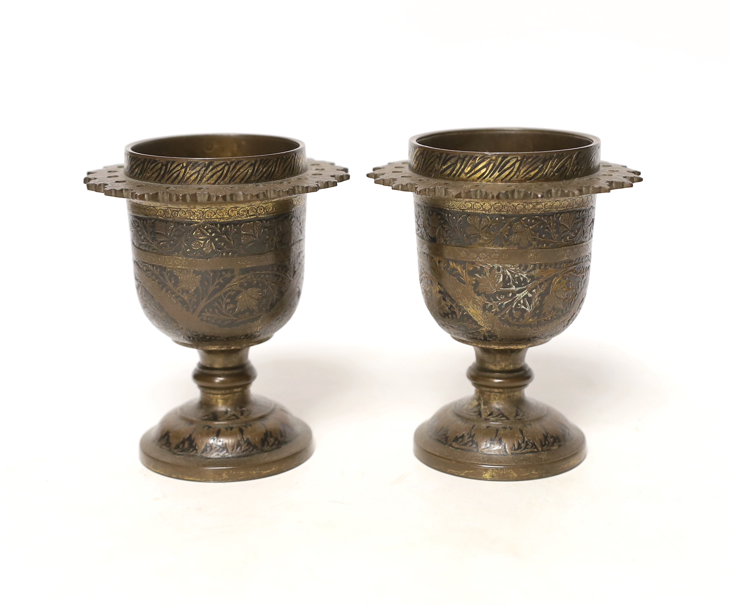 A pair of late 19th century Indian brass vases, 12cm high